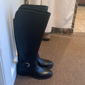 Brand new size 6M black INC boots; never worn.